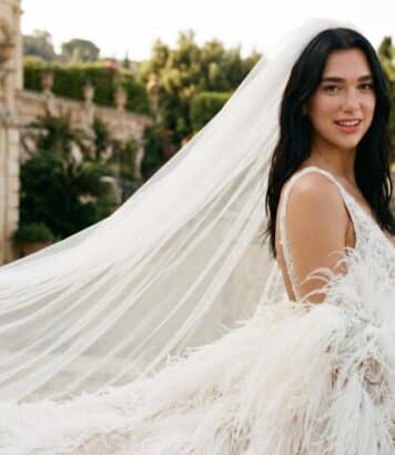 ParisSelectBook - Traîne de plumes et voile vertigineux : Dua Lipa dévoile enfin sa robe de mariée Chanel haute couture