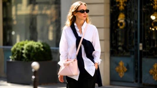 Jennifer Lawrence wears the Dior Cigale bag in pale pink on an ultra-minimalist look