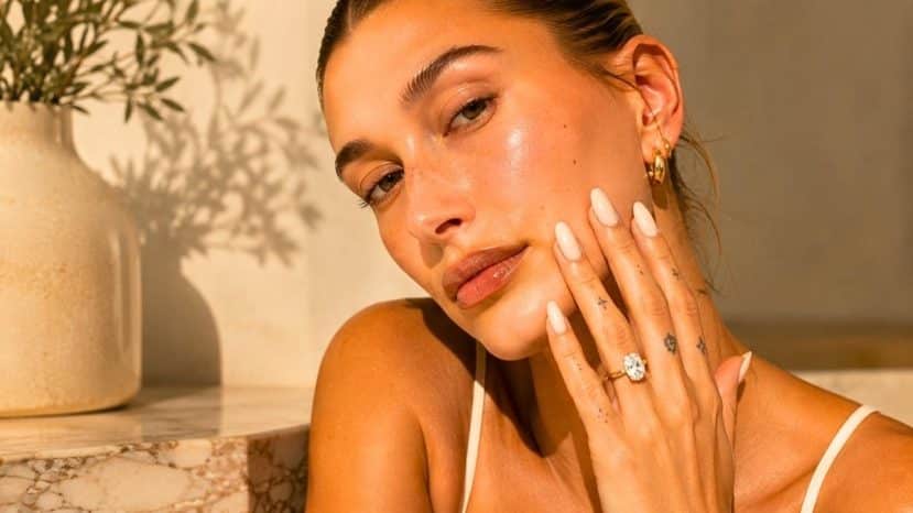 Hailey Bieber is wearing the vanilla milk manicure, summer's softest nail trend