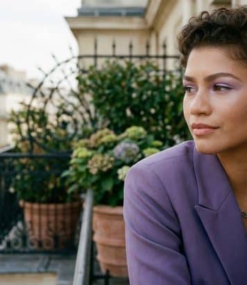 Zendaya debuts a curly pixie cut and lilac Prada Beauty makeup look
