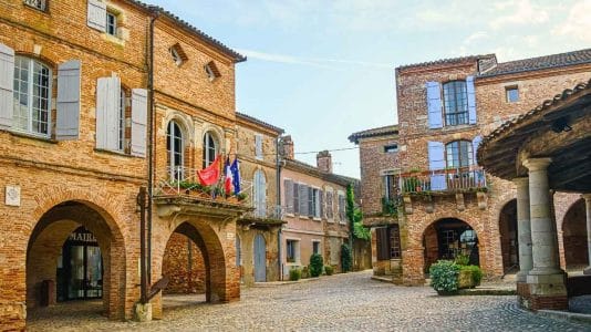 Perched above the Garonne, this village in Tarn-et-Garonne hides a market hall found nowhere else in France